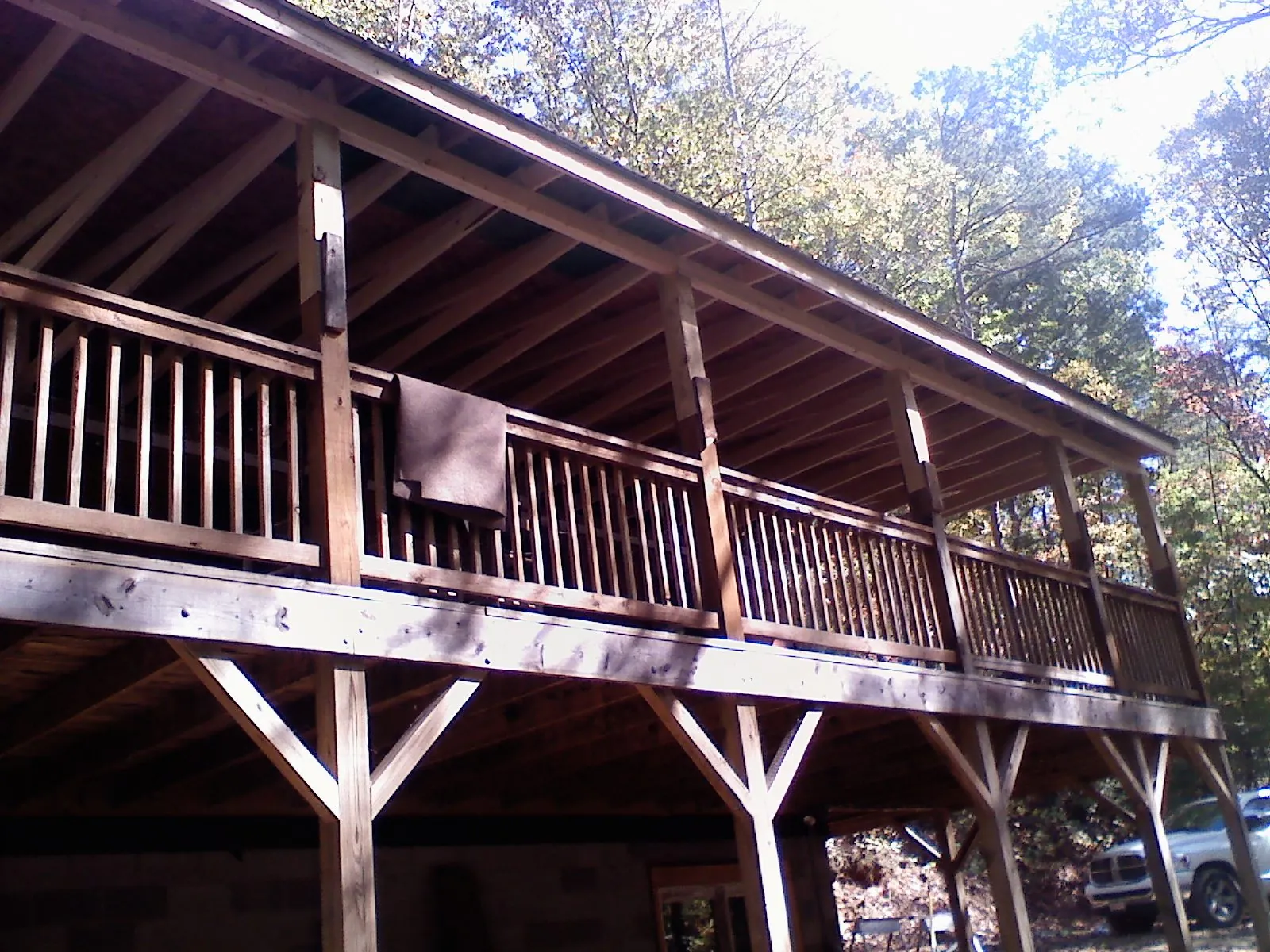 Timber framing under a new elevated porch and deck — Roof Leak Repair in Millville by Roofing Brothers